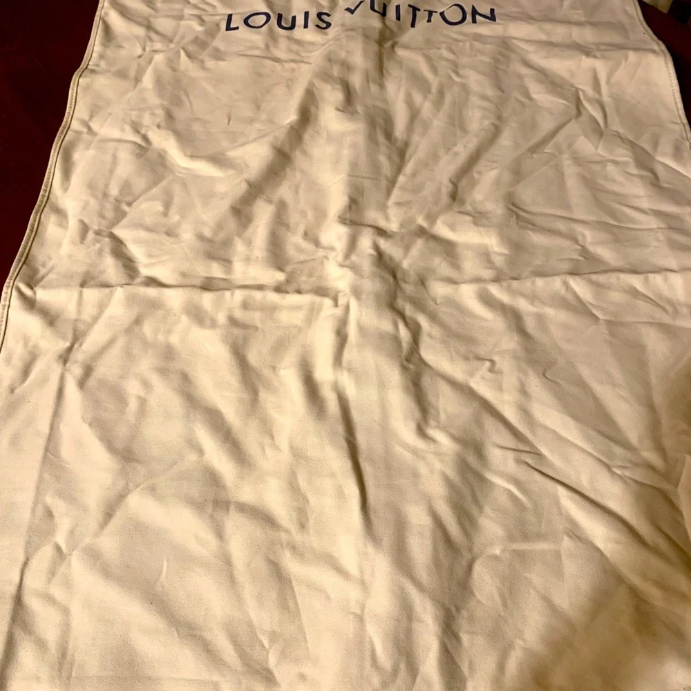 Brand new authentic Luise Vuitton dust cover
